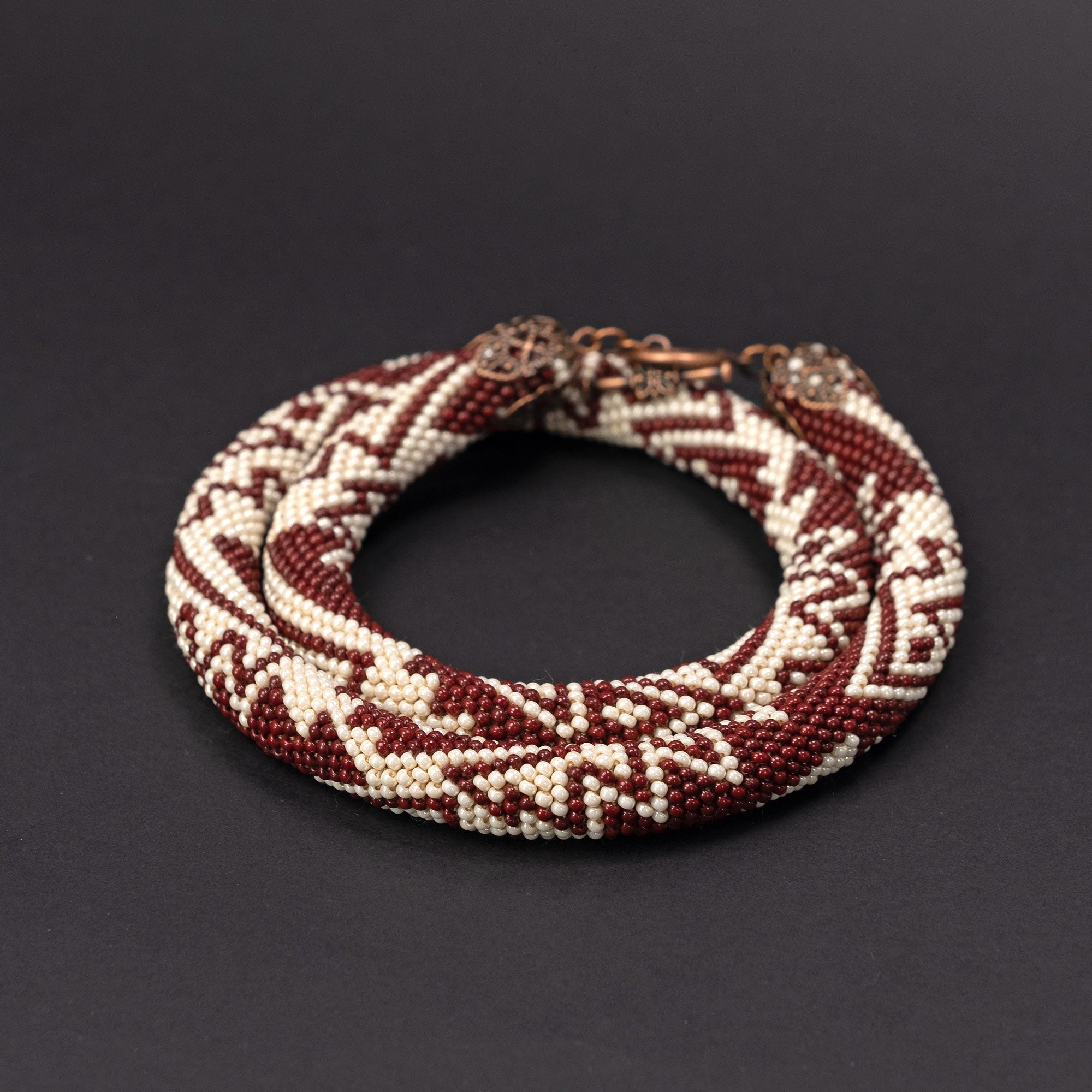 Beaded crochet necklace "Ancient Fish"