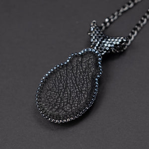 Pendant "Tiny Feather"